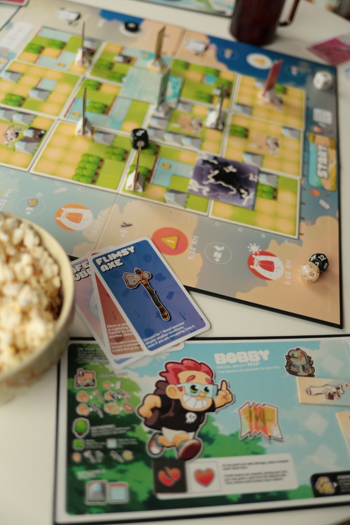 Rough! board game set up on the table with cards and dice